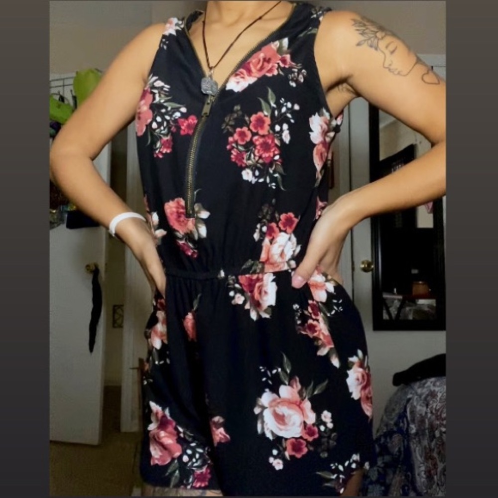 Black and floral print romper.